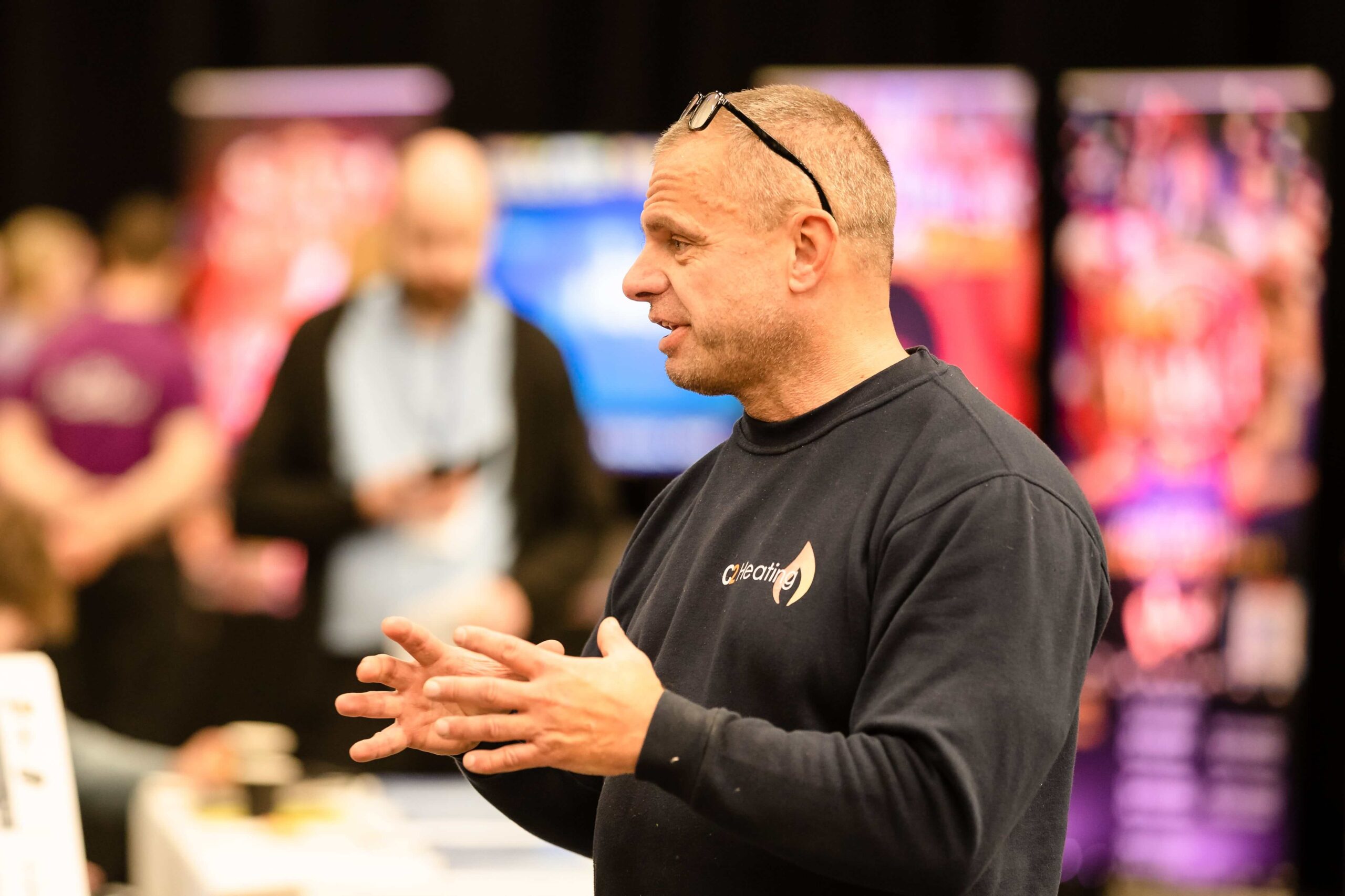 A male Blackpool Business Expo visitor chatting