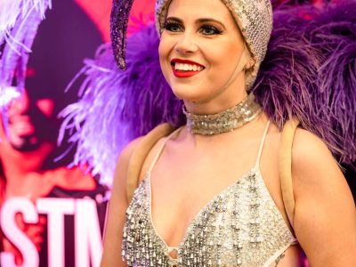 Image shows one of the Viva showgirls smiling
